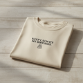 Light cream crew-neck T-shirt with front graphic text "Keep Calm Its My Birthday"