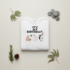 White crewneck sweatshirt with 'It's My Birthday' cat graphic, crew neck