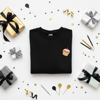 Black crewneck sweatshirt with embroidered cupcake on the chest