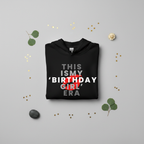 Black pullover hoodie, hood and front text graphic with red birthday girl