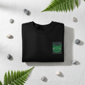Black sweatshirt folded, square frog face embroidered patch on chest