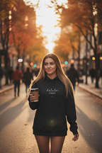 Black hoodie with delulu vibes print and small heart below