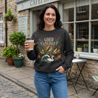 Black unisex sweatshirt with botanical “Good Energy” front graphic