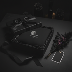 Black hooded sweatshirt with lion Stay Humble graphic, presented in a gift box with ribbon