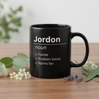 Black mug with Jordan noun definition text and list of Foodie, Problem Solver, Sports fan