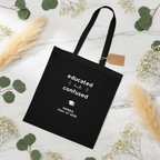 Black tote — nature flat lay