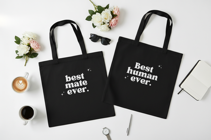 Black totes on white table