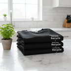 Folded black T-shirts with Reduce Reuse Recycle print stacked