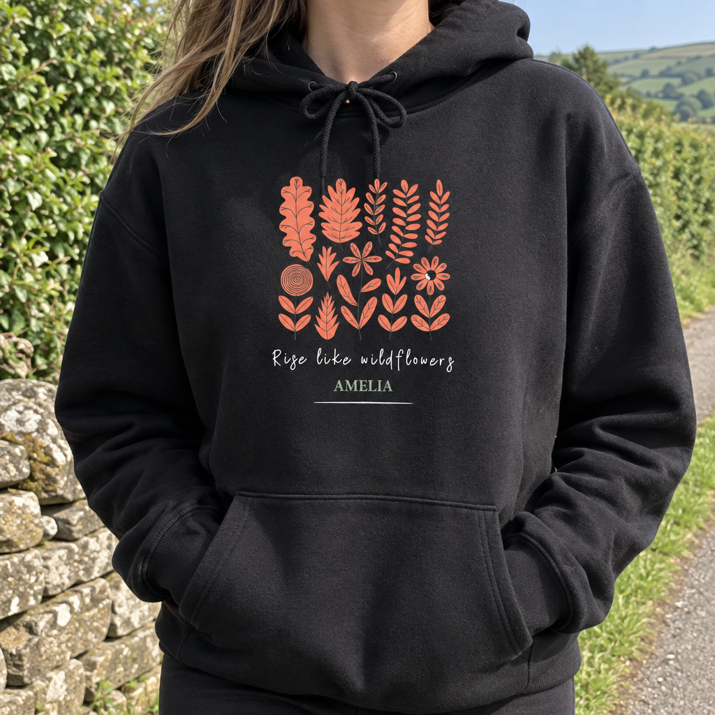 Black Wildflowers hoodie with Amelia on a countryside walk
