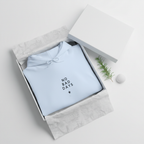 Light blue hooded sweatshirt folded in gift box with chest graphic