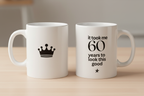 White ceramic birthday mug with crown icon and '60 years to look this good' text