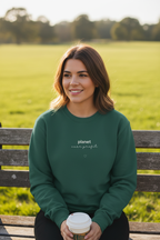 Bottle green crewneck sweatshirt with small chest logo and heart graphic