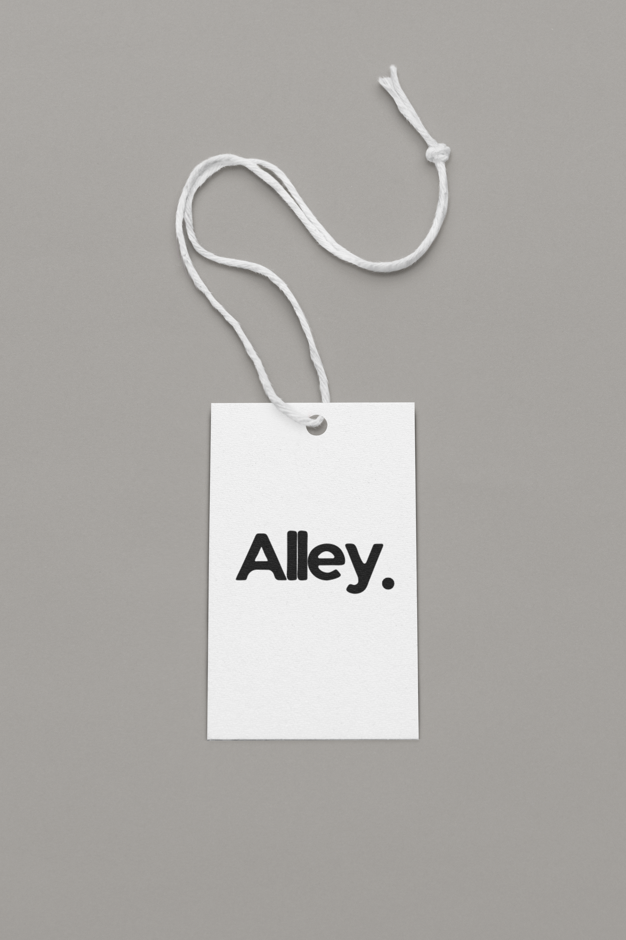 T-shirt hang tag with string and text: “Alley.”