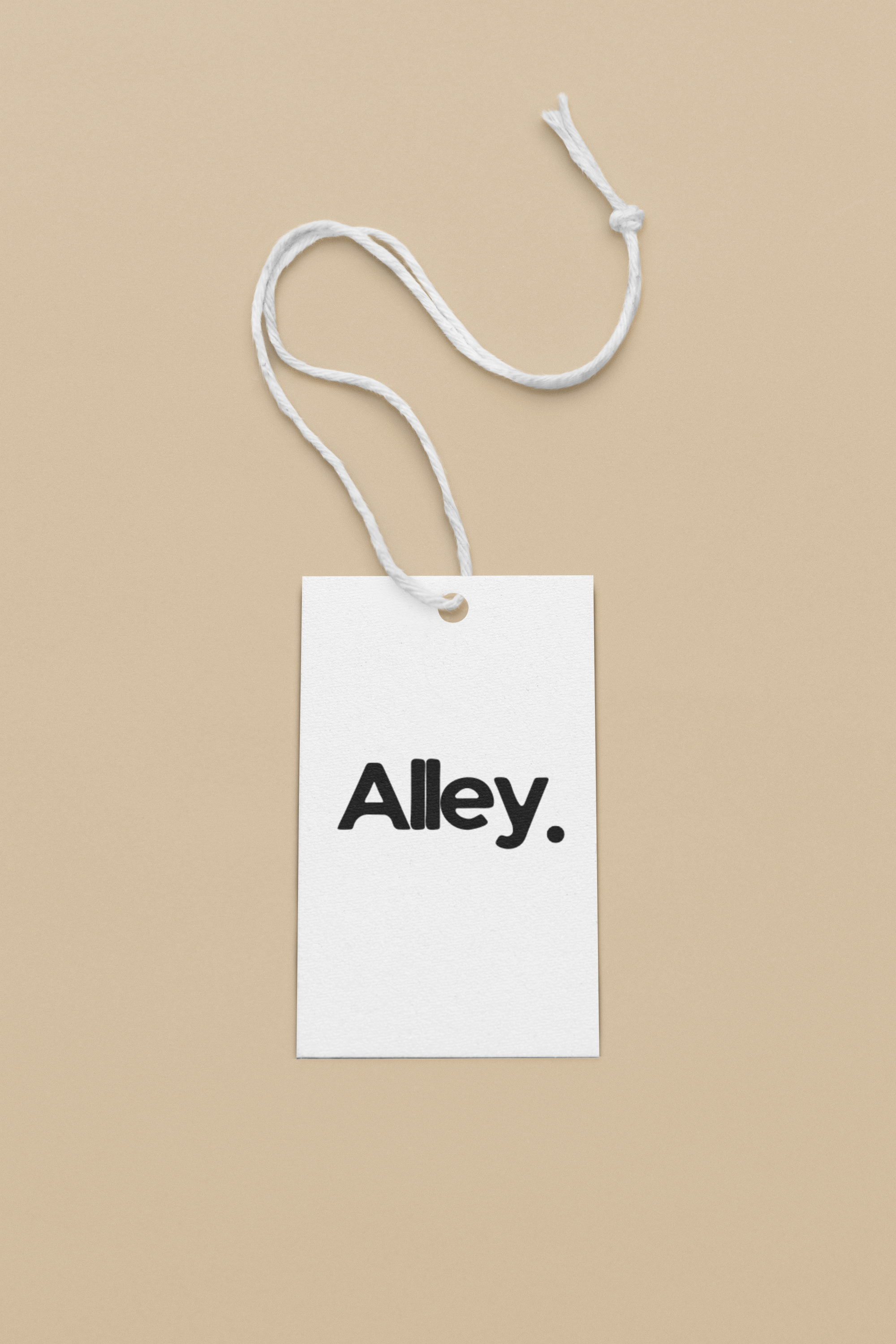 White hoodie with “Alley.” hang tag tied to the hood string