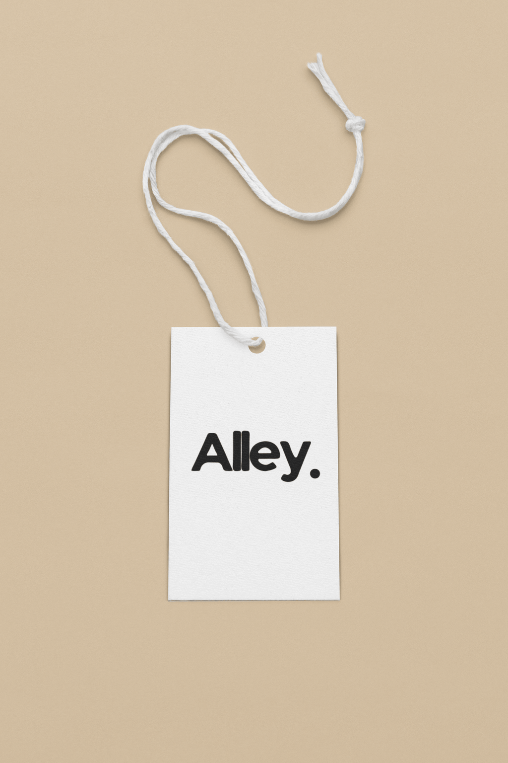 Sweatshirt product tag on a white string, reading “Alley.”