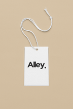 Sweatshirt product tag on a white string, reading “Alley.”
