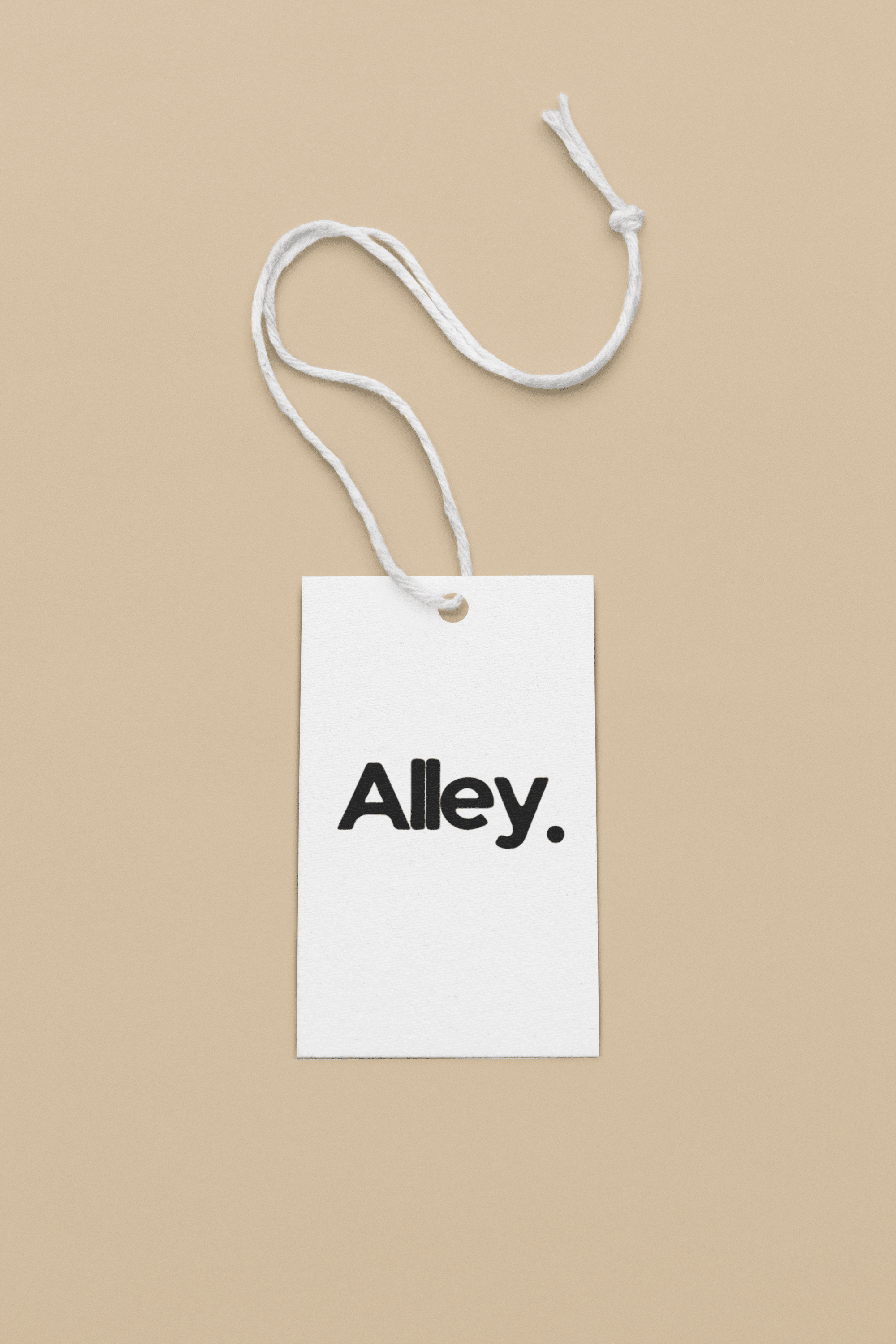 Sweatshirt product tag on a white string, reading “Alley.”