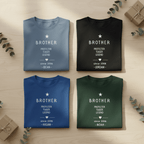 Set of four folded crew-neck t-shirts: light blue, black, navy, and forest green with 'BROTHER'