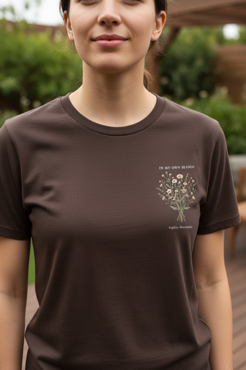 Brown T-shirt with small botanical bouquet graphic on the chest