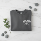 Charcoal crewneck birthday shirt with “This is my BIRTHDAY shirt” print.
