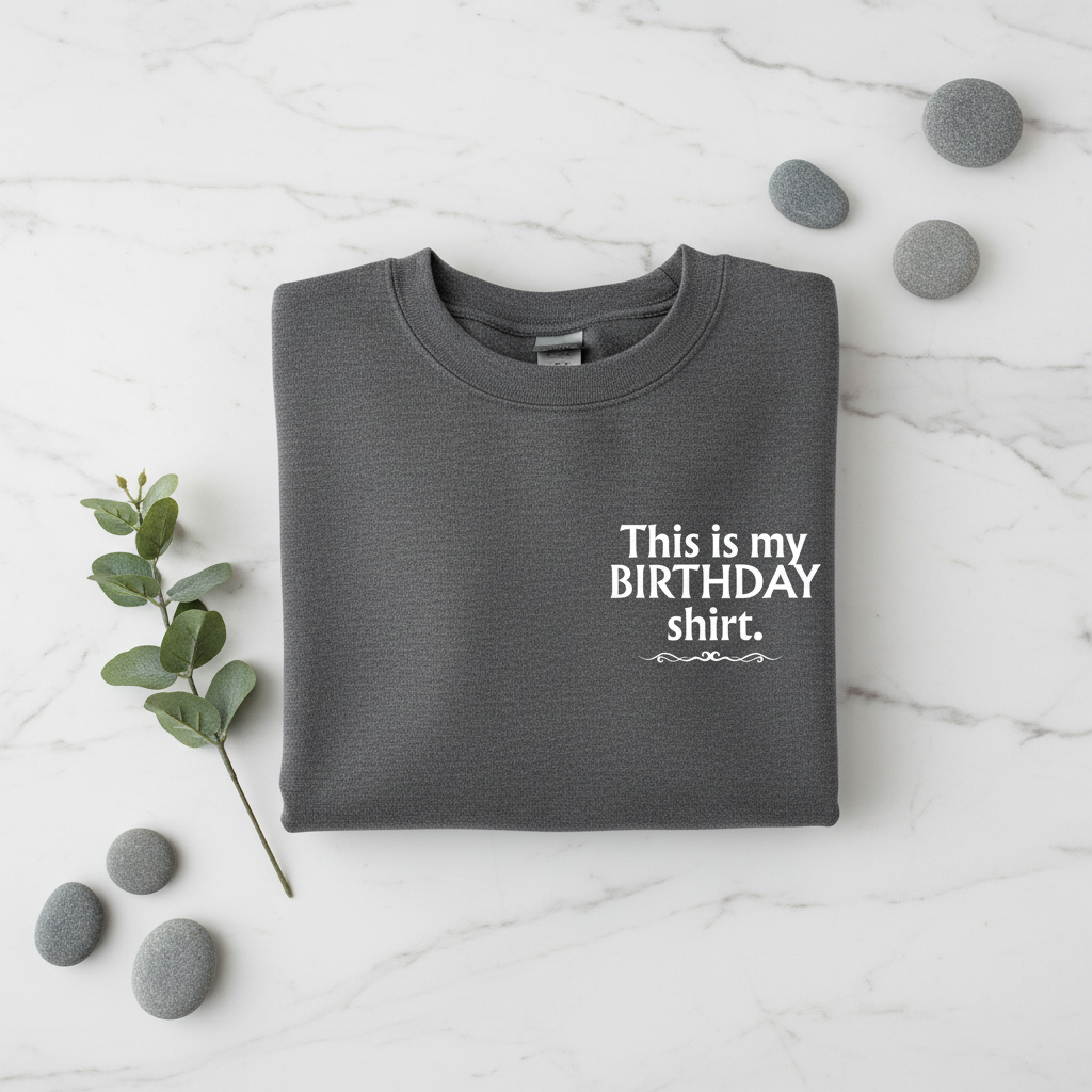Charcoal crewneck birthday shirt with “This is my BIRTHDAY shirt” print.