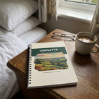 Charlotte countryside notebook on a bedside table