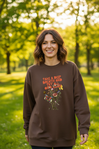 Dark brown crewneck sweatshirt worn with colorful “Take a Deep Breath” floral graphic.
