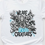 White unisex T-shirt close-up of “We Are God’s Creatures” animal graphic print.
