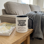 Climbing mug beside a sofa with walking-day essentials