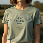 Light teal crew-neck T-shirt with dark “GOOD ENERGY ONLY” graphic centered on chest