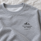 Close-up sport-grey Mountains Are Calling sweatshirt with Charlie