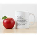 White ceramic teacher mug with 'teacher' text and quote, front and handle