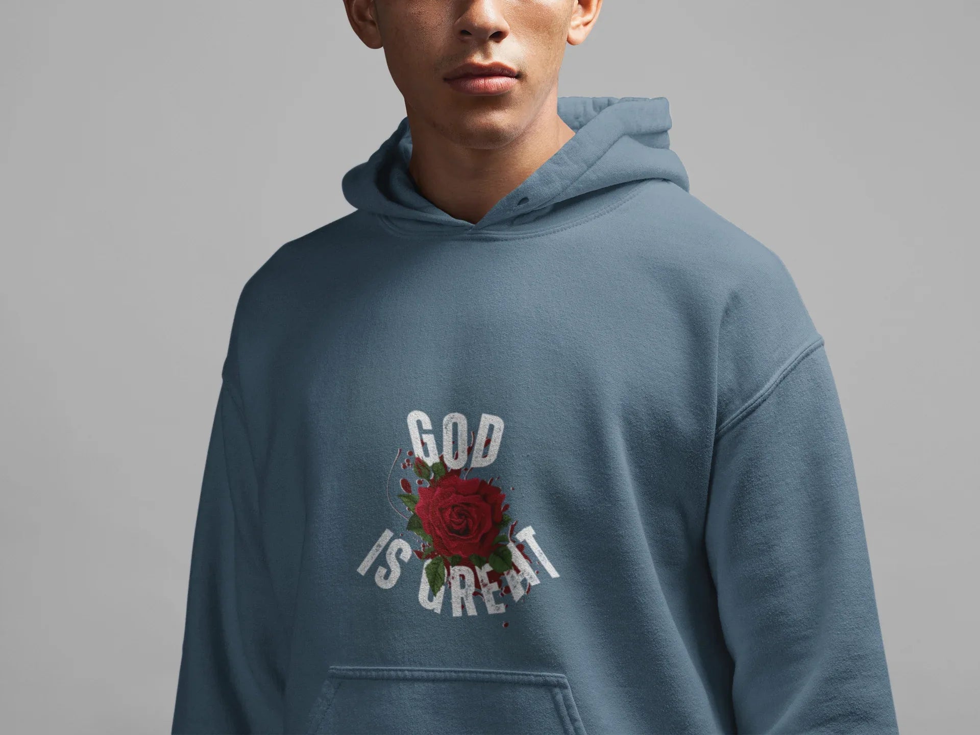 Blue hooded sweatshirt with front pocket and 'GOD IS GREAT' rose graphic