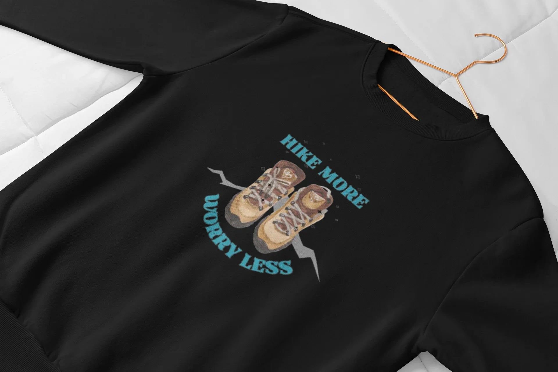 Black crewneck sweatshirt with 'Hike More, Worry Less' hiking boots graphic on chest