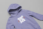 Light purple unisex slogan hoodie close-up with hood and logo
