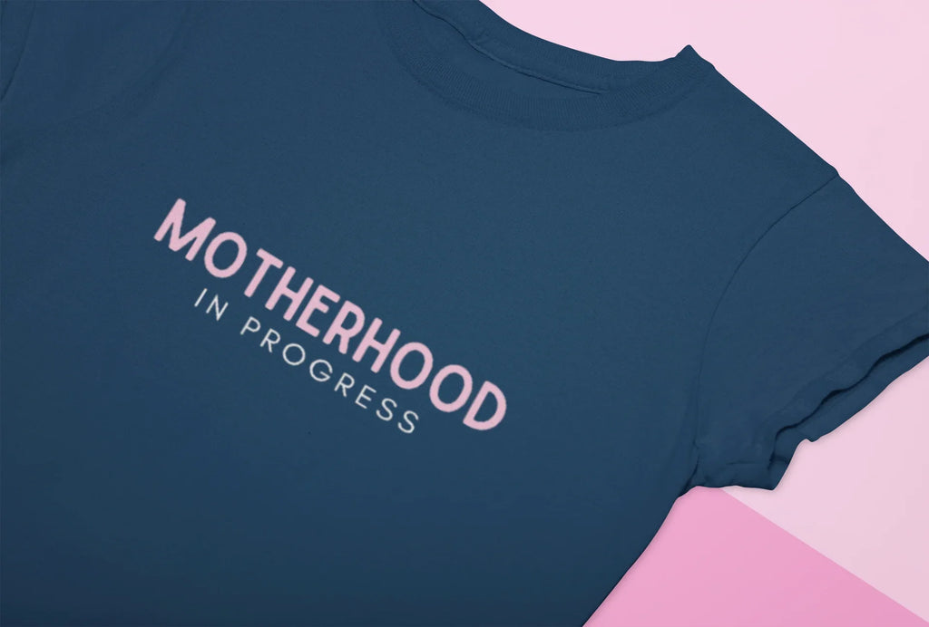 Navy heavy cotton maternity T-shirt with "Motherhood in Progress" logo print