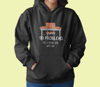 Dark charcoal unisex hoodie with drawstring hood and front pocket; '99 problems' desk graphic.