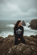 Black monster graphic hoodie with hood and front pouch pocket, long sleeves.
