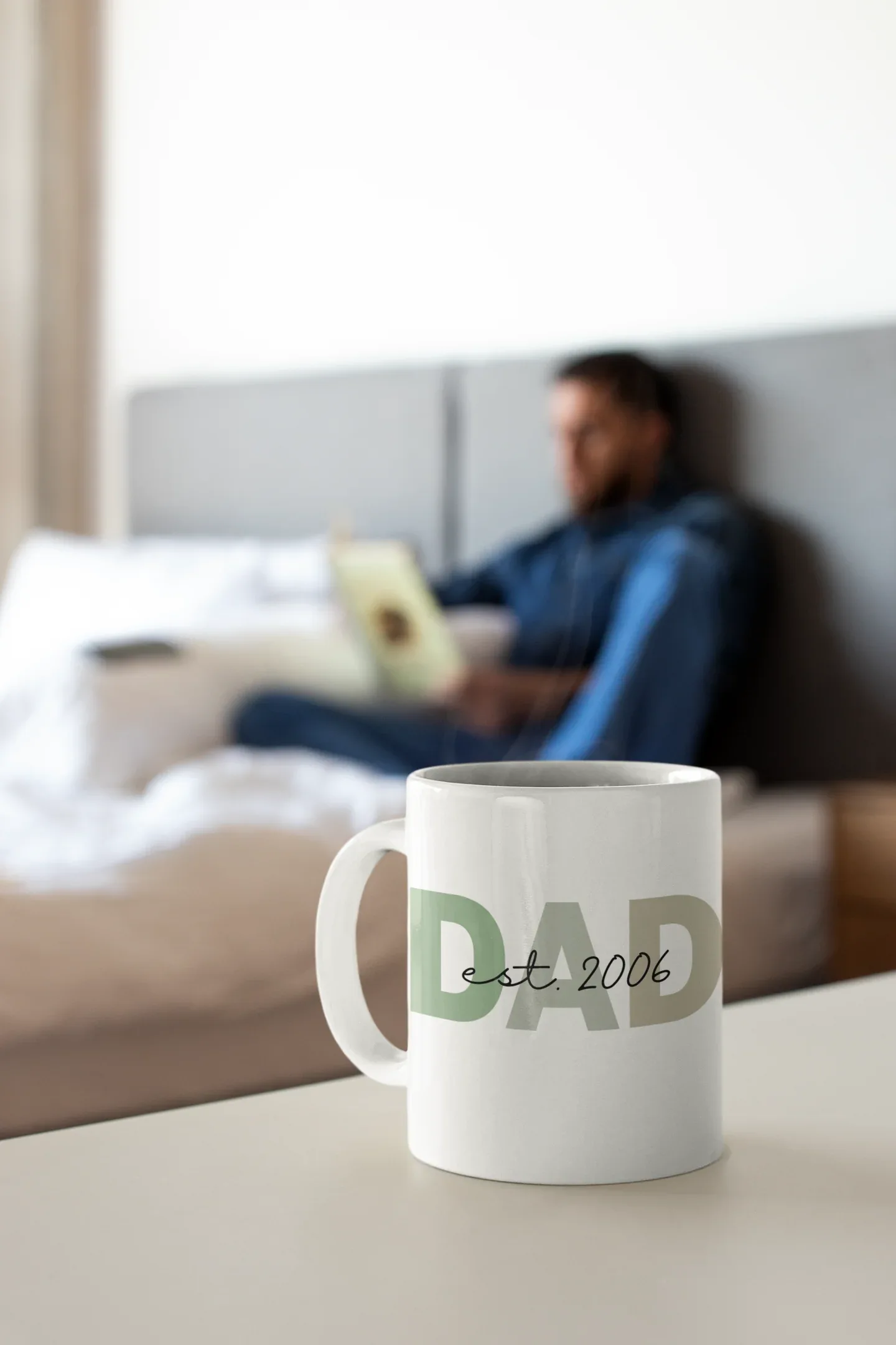 White ceramic coffee mug with DAD and Est. 2006 print