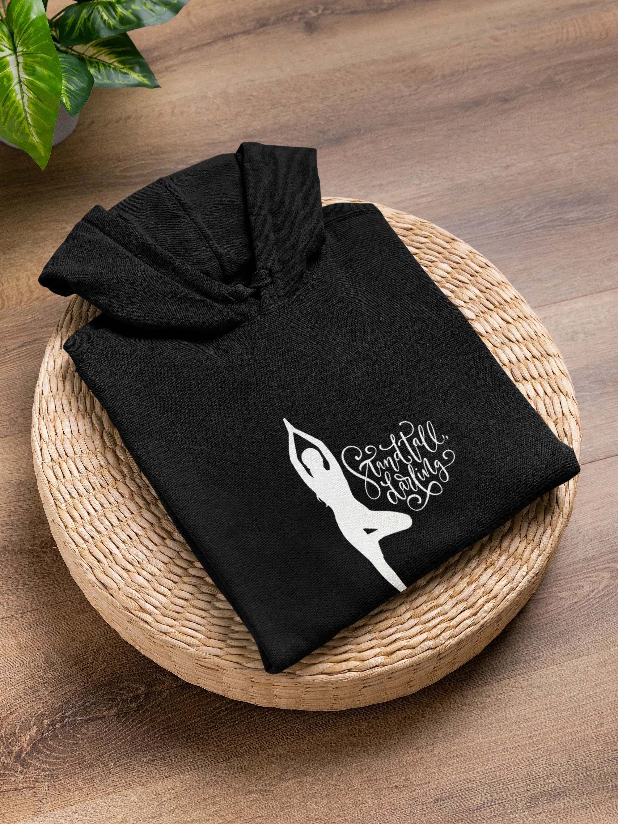 Black pullover hoodie with drawstring hood and dancer silhouette inspirational graphic