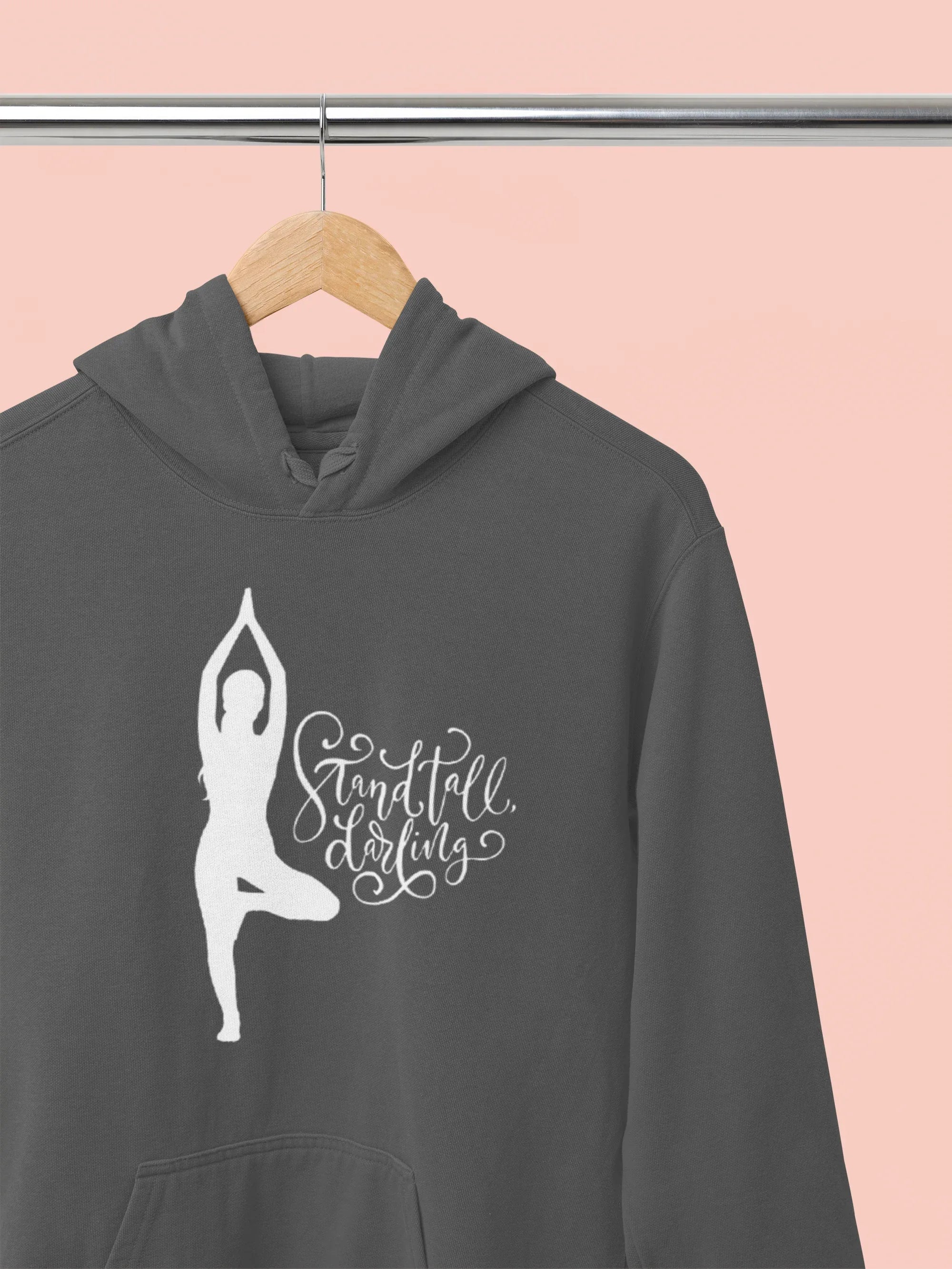 Charcoal gray hoodie with front hood and yoga silhouette logo on the chest.