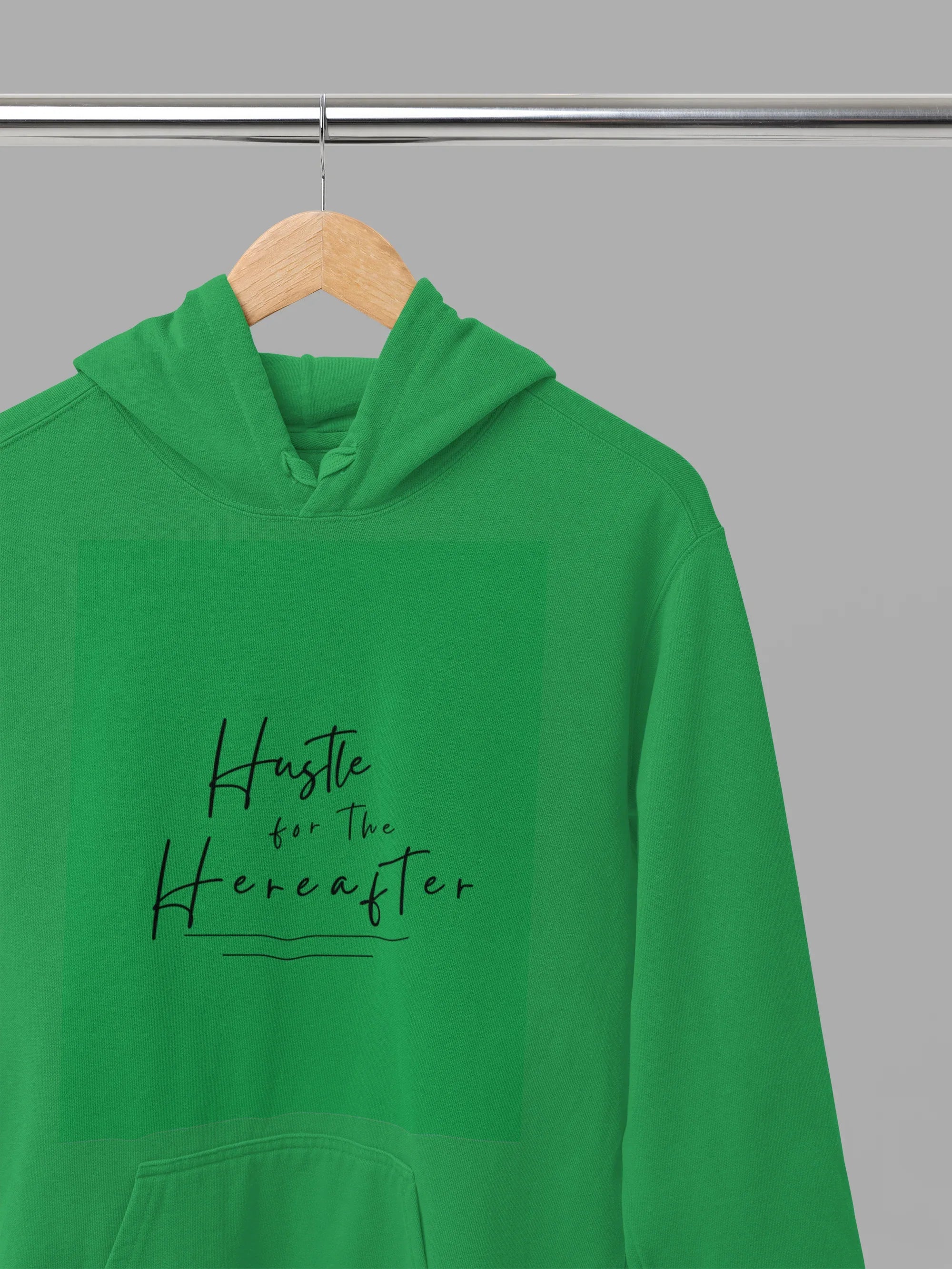 Green hooded sweatshirt with dark handwritten inspirational text graphic
