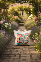 White canvas tote bag with colorful 'good vibes' retro wave print and handles
