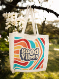 Good Vibes tote bag, white canvas with rainbow waves and “good vibes” graphic