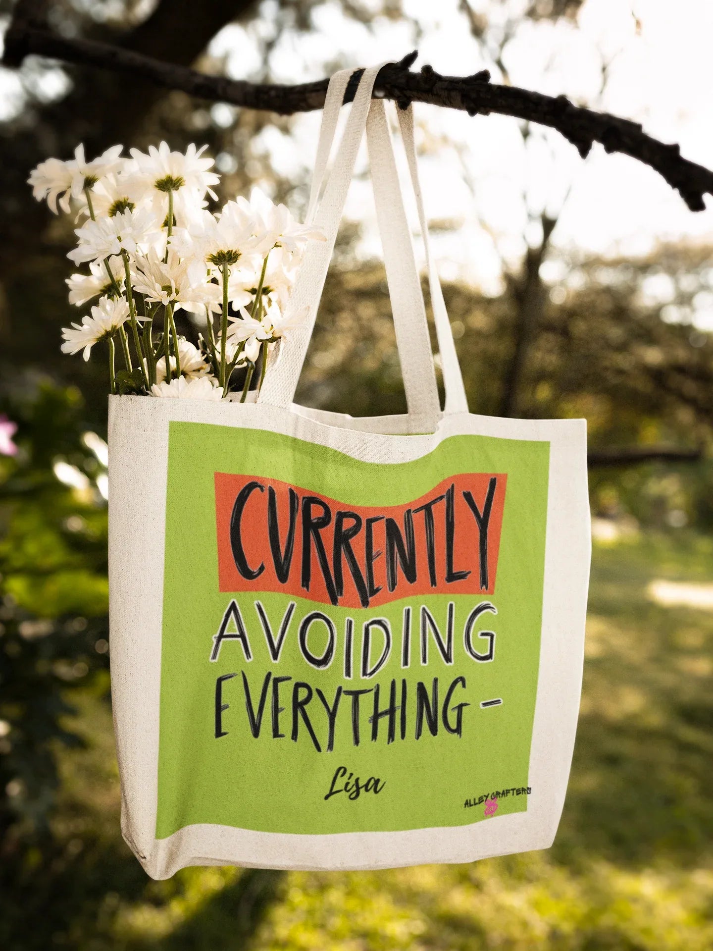 White canvas tote with lime green front panel and 'Currently Avoiding Everything-' text, Lisa