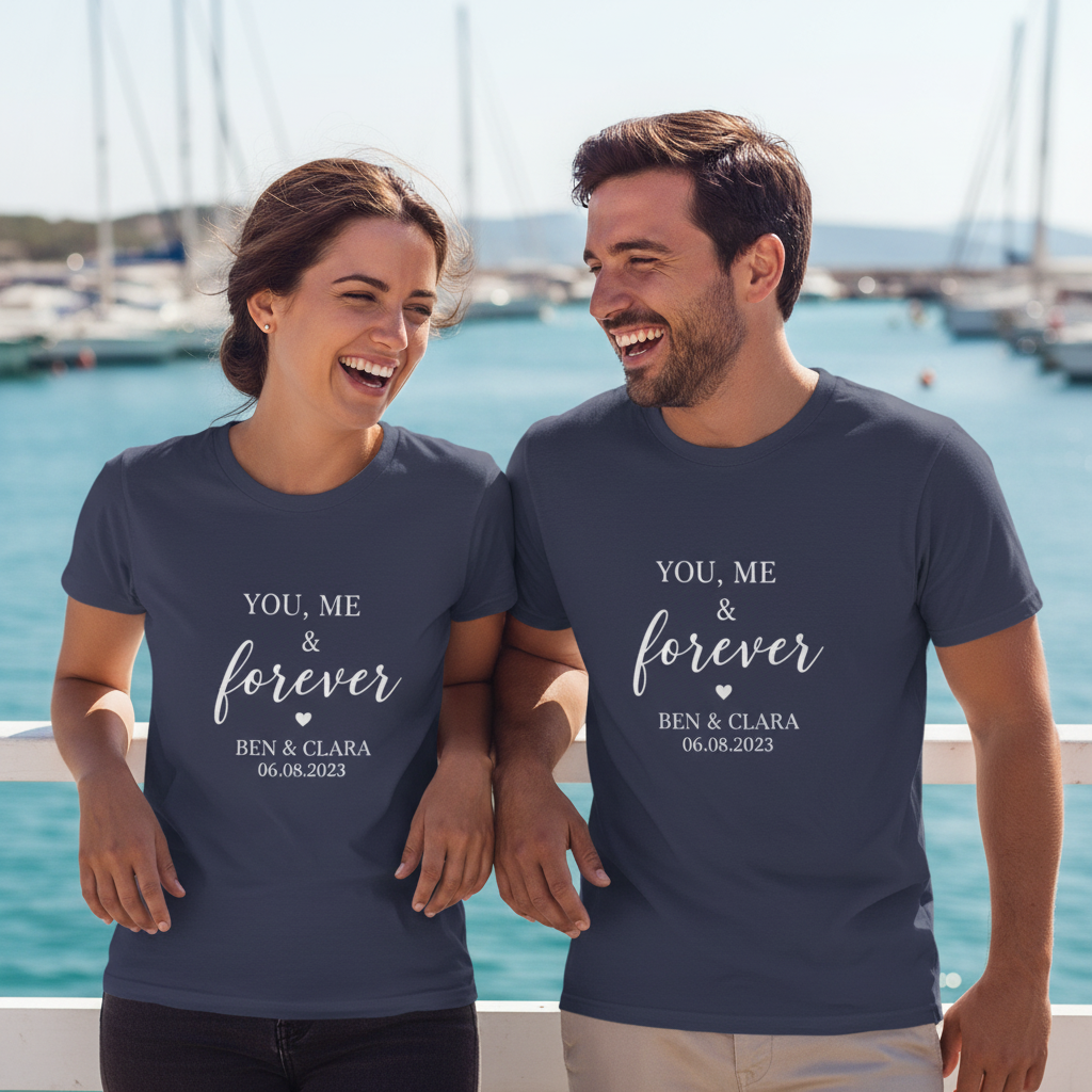 Couple in navy tees at harbour