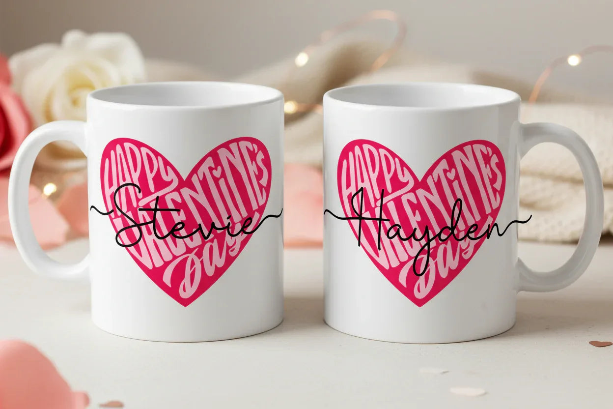 Pair of white ceramic mugs with pink heart “Happy Valentine’s Day” print