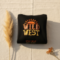 Black hoodie with Wild West logo and Stay Wild Soft Heart text on front