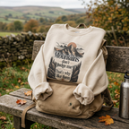 Light tan sweatshirt with front mountain and quote graphic, crewneck