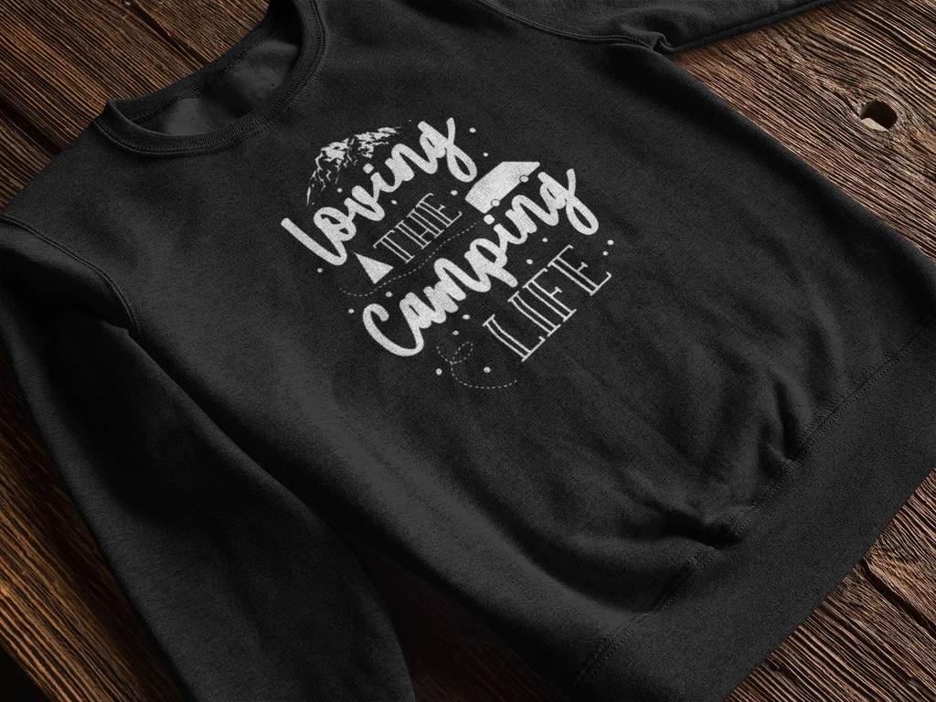 Black sweatshirt laid flat with white "Loving the Camping Life" graphic